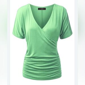 E9- medium green tee size M MADE BY JOHNNY